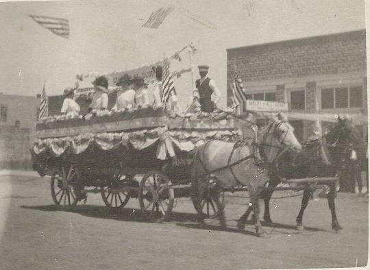 Ladies Riding on a Float