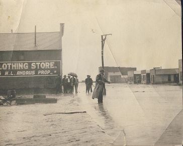 Man Standing in Flooded Waters