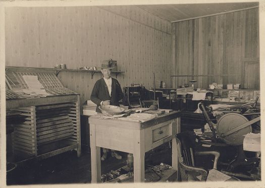 George Wood in the office of the San Luis Valley News in Blanca