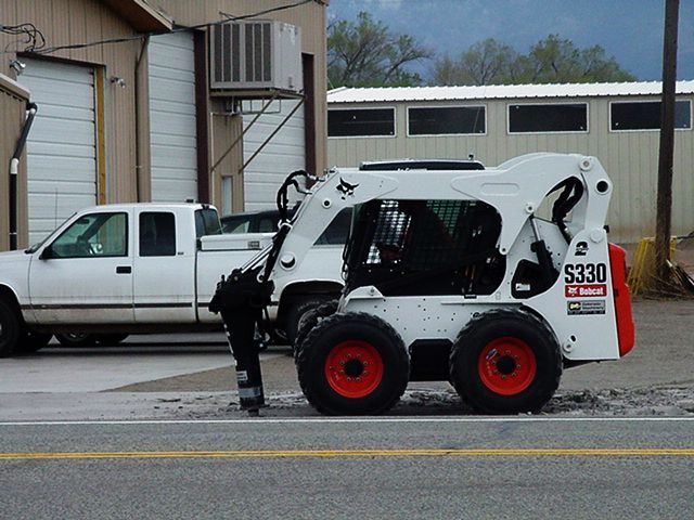 Jack Hammer Breaks Up the Old Sidewalk